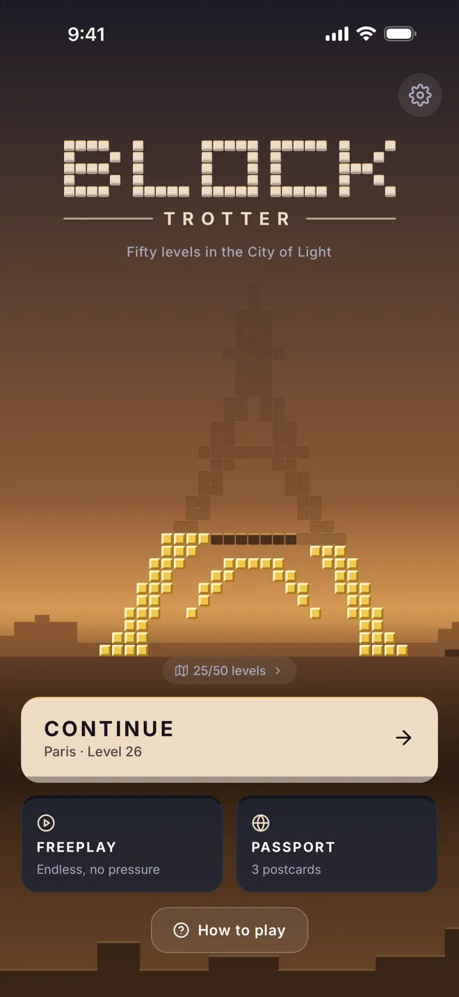 The home screen. An Eiffel Tower drawn in blocks, its lower half turned gold, above a Continue button for Paris level 26.