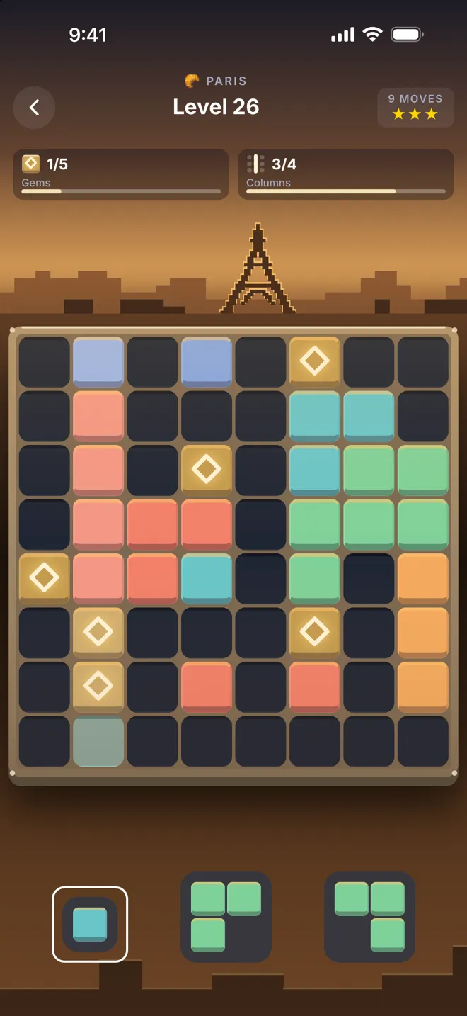 Level 26 in Paris. An eight by eight board half filled with coloured blocks and gem tiles, under a pixel Eiffel Tower, with three pieces waiting below.